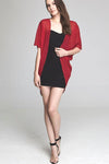 Model wearing short red chiffon kimono facing front